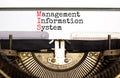 MIS management information system symbol. Concept words MIS management information system typed on retro typewriter. White Royalty Free Stock Photo