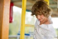 Mischievous boy 10-11 years old on the playground. Royalty Free Stock Photo