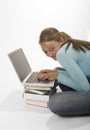 Mischievous girl on laptop Royalty Free Stock Photo