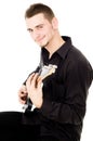 Mischievous guy plays the electric guitar Royalty Free Stock Photo