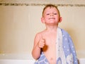 Mischievous little boy in his bath Royalty Free Stock Photo