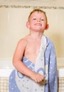 Mischievous little boy in his bath Royalty Free Stock Photo