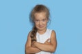 Mischievous little gir with curly hairl making sarcastic face, like seriously Royalty Free Stock Photo