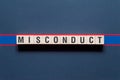 Misconduct word concept on cubes