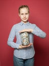 Miser kid. Teen girl with money cash Royalty Free Stock Photo