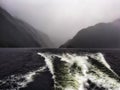 A miserable day sailing in heavy rain in Doubtful Sound in Fiordland Royalty Free Stock Photo