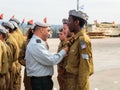 Officers of the IDF reward the soldier with the insignia at the formation in Engineering Corps Fallen Memorial Monument in Mishmar