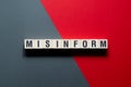 Misinform word concept on cubes Royalty Free Stock Photo