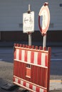 Misleading road signs, pedestrians in the direction of railway station