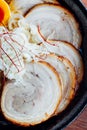 Miso Chashu Ramen: Japanese noodle in Miso soup with chashu pork, boiled egg, dry seaweed and chives in black bowl. Royalty Free Stock Photo