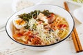 Miso Ramen Asian noodles with cabbage kimchi, seaweed, egg, mushrooms Royalty Free Stock Photo