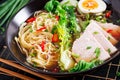 Miso Ramen Asian noodles with egg, pork and pak choi cabbage in bowl Royalty Free Stock Photo