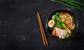 Miso Ramen Asian noodles with egg, pork and pak choi cabbage in bowl Royalty Free Stock Photo