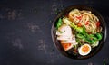 Miso Ramen Asian noodles with egg, pork and pak choi cabbage in bowl Royalty Free Stock Photo