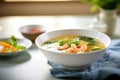 miso soup with shrimp and watercress, bright lighting