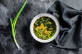 Miso soup with tofu and seaweed. Black background. Top view Royalty Free Stock Photo