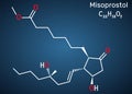 Misoprostol molecule. Structural chemical formula on the dark blue background