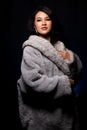 Miss beauty fashion asian woman in Fur Gray winter