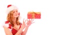 Miss Santa is Catching a Red Gift Box Royalty Free Stock Photo