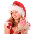 Miss Santa is Holding an Fancy Gift Bag Royalty Free Stock Photo