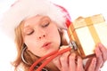 Miss Santa is Sounding a Golden Gift Box Royalty Free Stock Photo