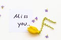 Miss you message card handwriting with yellow flowers ylang ylang arrangement music score