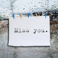 Miss you message on Clothes peg and paper notes Royalty Free Stock Photo