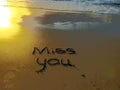 Miss you written in sand Royalty Free Stock Photo