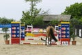 Equitation contest, horse refusing to jump over an obstacle Royalty Free Stock Photo