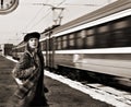 Missed train, hasten woman on railroad station Royalty Free Stock Photo