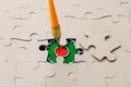 Missing puzzle piece and framed dartboard. Background with copy space Royalty Free Stock Photo