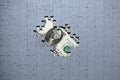 Missing puzzle pieces on the background of money, hidden assets, tax amnesty, american dollar concept