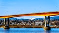 Mission Bridge over the Fraser River on Highway 11 between Abbotsford and Mission with snow covered Mount Robie Reid