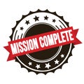 MISSION COMPLETE text on red brown ribbon stamp