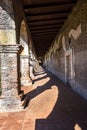 Brick Arches and Red Floor Tiles in Corridor of Historic Mission San Juan Capistrano Royalty Free Stock Photo