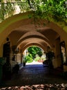 Hacienda style Mexican architecture corridor opening toward courtyard