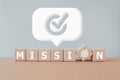 MISSION on wooden cube blocks with dartboard instead of \