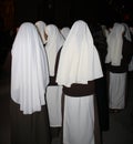 Missionary nuns waiting inside the cathedral. Royalty Free Stock Photo