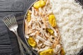 Mississippi Pulled Chicken with ranch seasoning, dried au jus gravy mix and pepperoncini peppers served with rice closeup on the Royalty Free Stock Photo