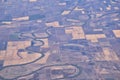 Mississippi River aerial landscape views from airplane over the border of Arkansas and Mississippi. Winding river and Rural town a Royalty Free Stock Photo