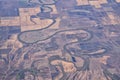 Mississippi River aerial landscape views from airplane over the border of Arkansas and Mississippi. Winding river and Rural town a Royalty Free Stock Photo