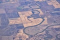 Mississippi River aerial landscape views from airplane over the border of Arkansas and Mississippi. Winding river and Rural town a Royalty Free Stock Photo