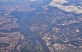 Mississippi River aerial landscape views from airplane over the border of Arkansas and Mississippi. Winding river and Rural town a