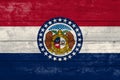 Missouri State flag on a wooden surface. Banner of the grunge Missouri State flag Royalty Free Stock Photo