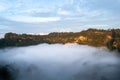 Mist hanging over the Kelimutu volcano. West Nusa Tenggara, Indonesia