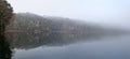 Mist over lake Eecham Rain forest reflection Royalty Free Stock Photo