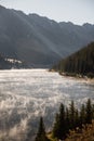 Mist rising off the top of a lake in Colorado. Royalty Free Stock Photo