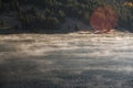 Mist rising off the top of a lake in Colorado. Royalty Free Stock Photo