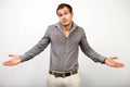 Mistake or sorry concept - confused man looking innocent Royalty Free Stock Photo