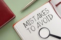 Mistakes to avoid message written on notebook page. Conceptual mistakes to avoids symbol Royalty Free Stock Photo